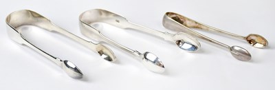 Lot 949 - Three pairs of hallmarked silver sugar tongs,...