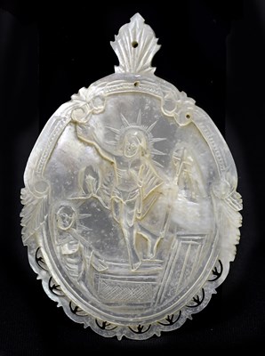 Lot 1085 - A carved mother of pearl religious panel of...