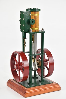 Lot 1535 - A green and red painted pillar twin wheel...