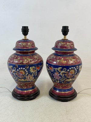 Lot 708 - A pair of table lamps, with a textural floral...
