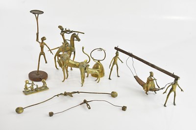 Lot 1227 - A collection of Benin style bronzes, including...