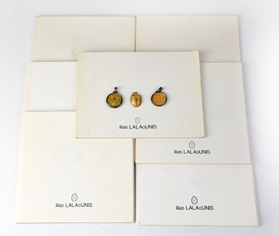 Lot 1176 - ILIAS LALAOUNIS; two 18ct gold pendants, 1989...