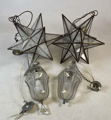 Lot 2712 - A pair of star shaped pendant light fittings...