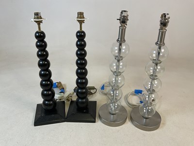 Lot 2730 - Two pairs of modern bobbin table lamps, one...