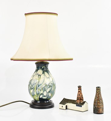 Lot 1571 - MOORCROFT; a baluster shaped table lamp in the...