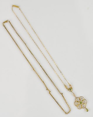 Lot 2163 - An Edwardian yellow metal peridot pendant, on...