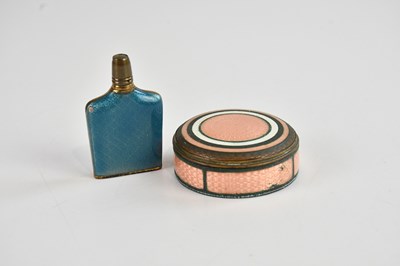 Lot 482 - A pink guilloche enamel pill box, together...
