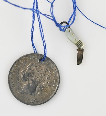 Lot 1110 - A rare late 19th century grain of rice...