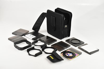 Lot 2374 - A collection of various camera filters and...