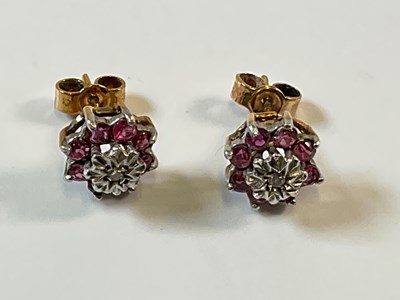 Lot 991 - A pair of 9ct yellow gold diamond and pale...