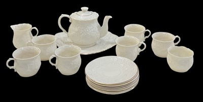 Lot 535 - BELLEEK; a six setting 'Serenity' pattern tea...