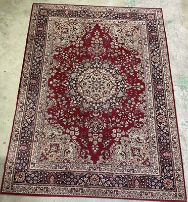 Lot 2744 - A machine woven woollen rug, made in Belgium...