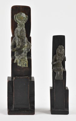 Lot 646 - An ancient Egyptian style bronze figure of...