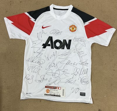 Lot 2701 - A Manchester United away football shirt from...