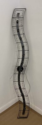 Lot 2719 - PORTA ROMANA; an unusual swept ceiling light.