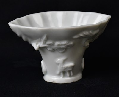Lot 173 - A Chinese Qianlon-Qing dynasty white glazed...