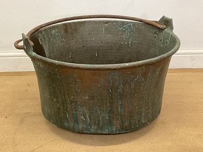 Lot 2747 - A large copper garden planter with forged...