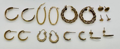 Lot 1039 - A group of 9ct gold and yellow metal earrings...