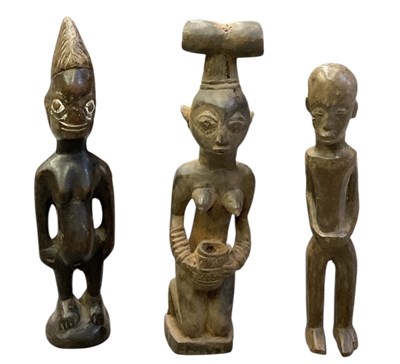 Lot 1048 - A South West Nigerian Yoruba carved wooden...