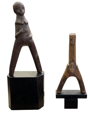 Lot 1039 - Two carved wooden tribal Lobi Burkina Faso...