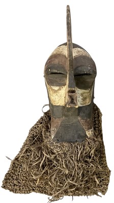 Lot 1006 - An African carved wooden Songye Kifwebe mask,...