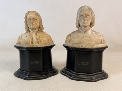 Lot 390 - A pair of early 20th century plaster busts,...