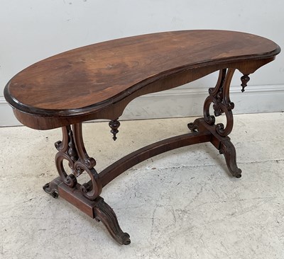 Lot 136 - A Victorian carved rosewood kidney shaped side...