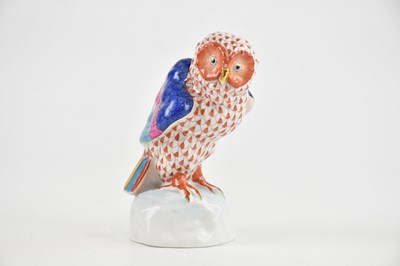 Lot 1737 - HEREND; a hand painted owl perched upon rock,...