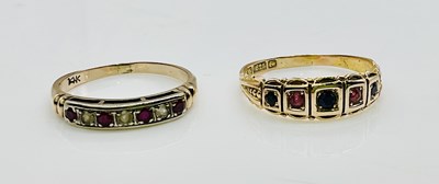 Lot 998 - A 15ct yellow gold five stone sapphire and...