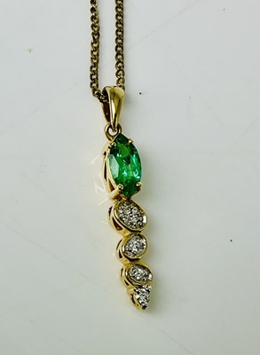 Lot 1000 - An 18ct yellow gold emerald and diamond...