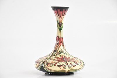 Lot 1402 - MOORCROFT; a ship's decanter shaped vase...