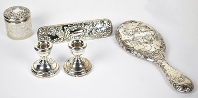 Lot 1201 - AT CANNON; a pair of Elizabeth II hallmarked silver dwarf candlesticks