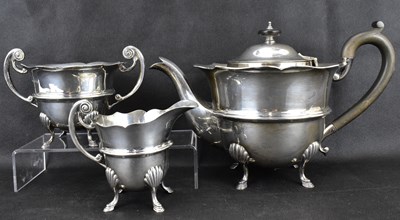 Lot 862 - A George V hallmarked silver three-piece tea...