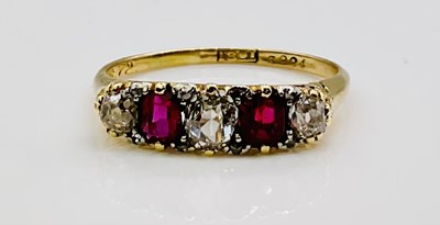 Lot 1005 - A Victorian 18ct yellow gold diamond and ruby...