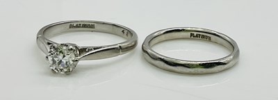 Lot 992 - A platinum and diamond solitiare ring, the...