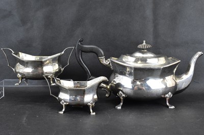 Lot 864 - A George V hallmarked silver three-piece tea...
