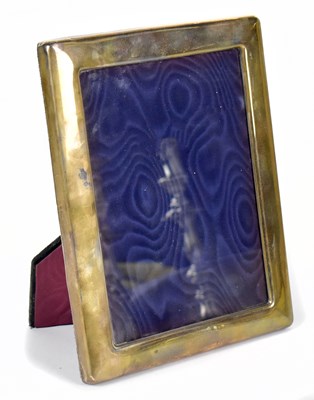 Lot 1192 - CARRS OF SHEFFIELD; an Elizabeth II hallmarked silver easel back photograph frame