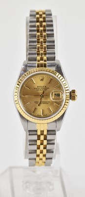 Lot 1606 - ROLEX; a lady's stainless steel and gold...