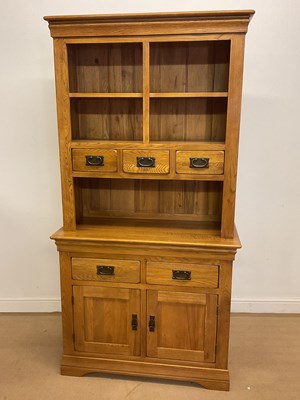 Lot 2799 - A modern light oak kitchen dresser, with...