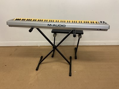 Lot 2384 - M-AUDIO; keyboard and a Bespeco stool
