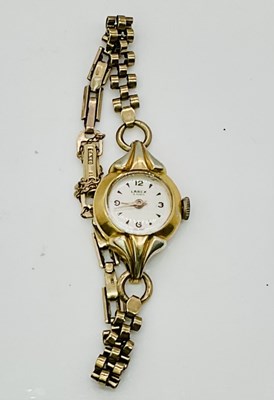 Lot 1104 - LAREX; a lady's vintage wristwatch, with 9ct...