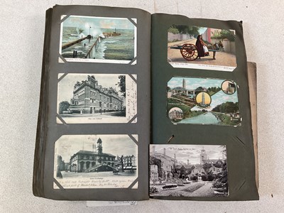 Lot 2115 - A postcard album comprising approximately...