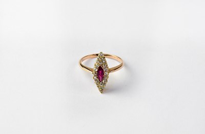 Lot 1033 - A 14ct gold marquise-shaped ring set with red...