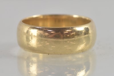 Lot 1208 - A 9ct yellow gold wedding band, size R, approx...