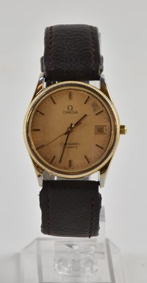 Lot 1404 - OMEGA; a vintage gentleman's gold plated...