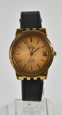 Lot 1429 - OMEGA; a vintage gentleman's gold plated...