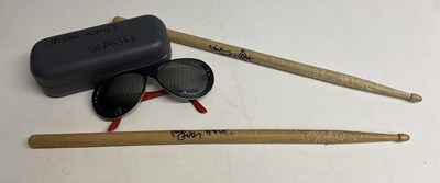 Lot 2353 - A pair of signed drumsticks by Dave Getz and a...