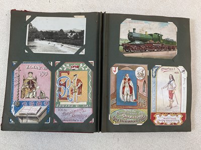 Lot 2114 - Two postcard albums comprising approximately...