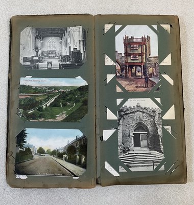 Lot 2096 - Three postcard albums comprising approximately...