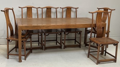 Lot 1562 - A reproduction Chinese elm dining table with...